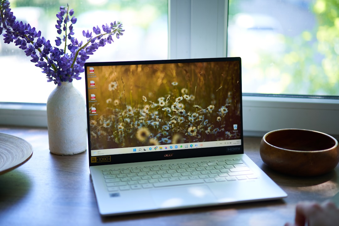 a-laptop-computer-on-a-table-hsm6j25oujs